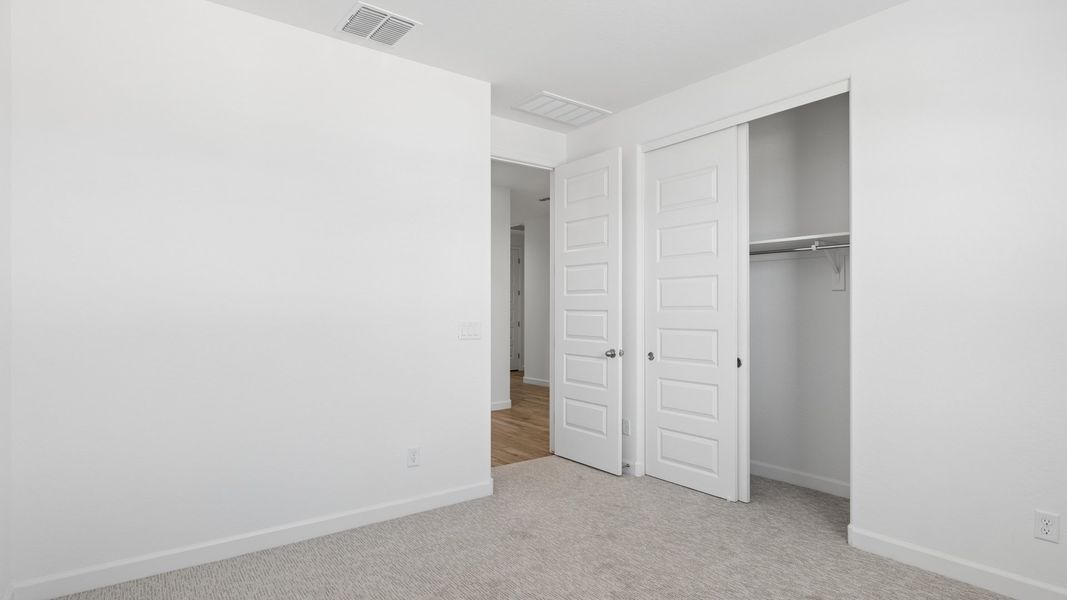 Spacious, unfurnished interior of a new home in Radiance at Superstition Vistas, Apache Junction (Image 31).