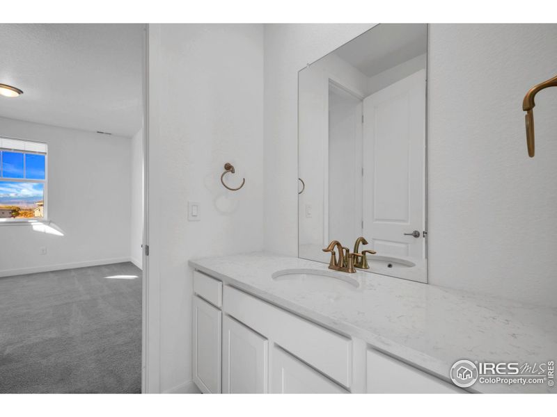 Furnished interior view inside a new home in Morgan Hill: The Grand Collection, Erie (Image 10). Furnished interior view inside a new home in Morgan Hill: The Grand Collection, Erie (Image 10).