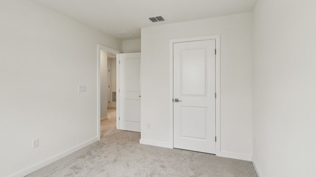 Furnished interior view inside a new home in Cyrene at Harmony, St. Cloud (Image 26). Furnished interior view inside a new home in Cyrene at Harmony, St. Cloud (Image 26).