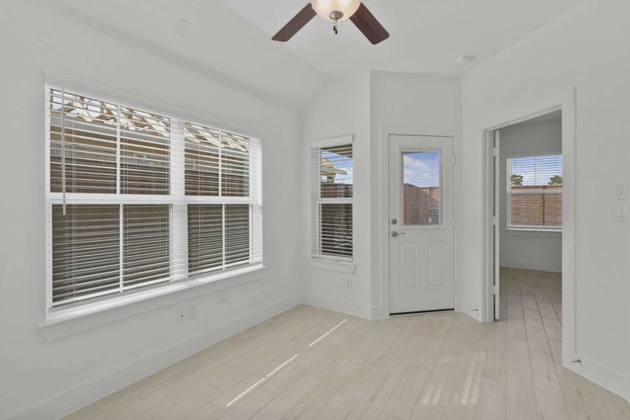 Representative unfurnished interior of a home built from the Chalet by Chesmar Homes in Meridiana Townhomes, Iowa Colony (Image 30).