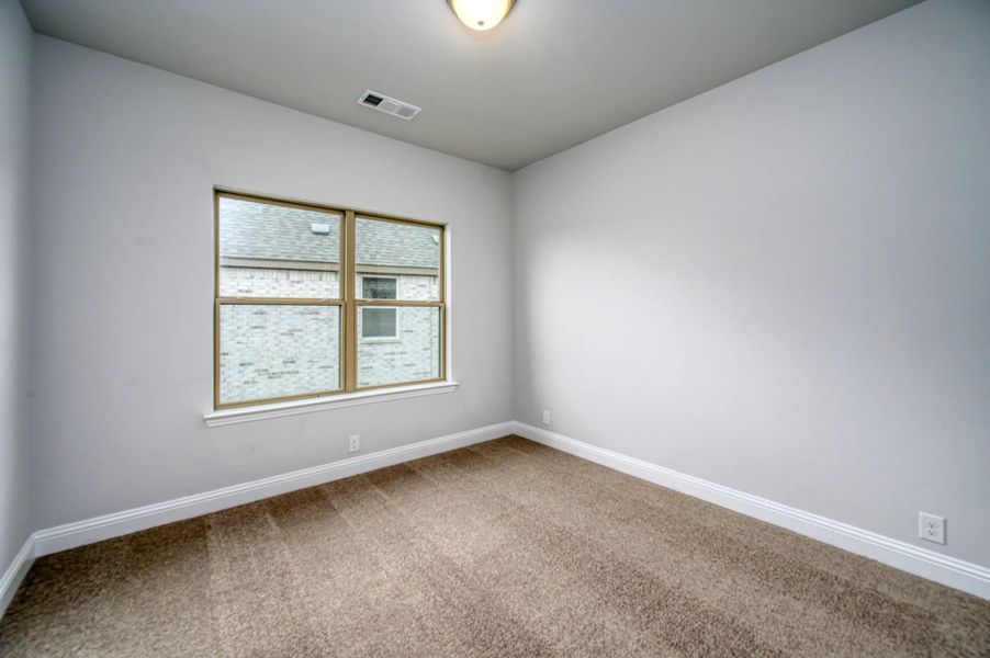 Representative unfurnished interior of a home built from the Portico by Stonehollow Homes in Heritage Grove, Blue Ridge (Image 19).