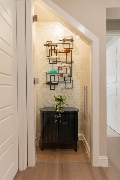 Detailed view of wood finished floors and baseboards