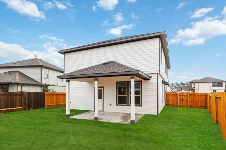 Front exterior of a new home in Granger Pines, Conroe, TX, highlighting curb appeal (Image 2). Front exterior of a new home in Granger Pines, Conroe, TX, highlighting curb appeal (Image 2).