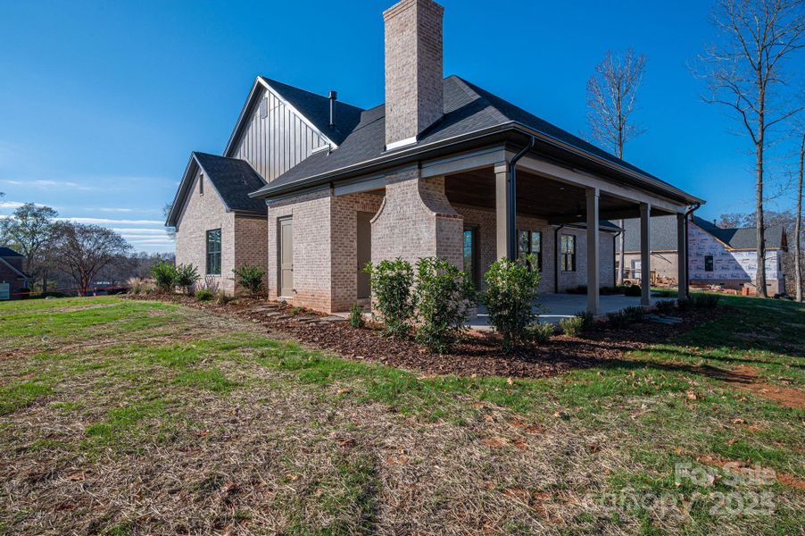 Exterior details and patio area of a home in , Belmont (Image 3).