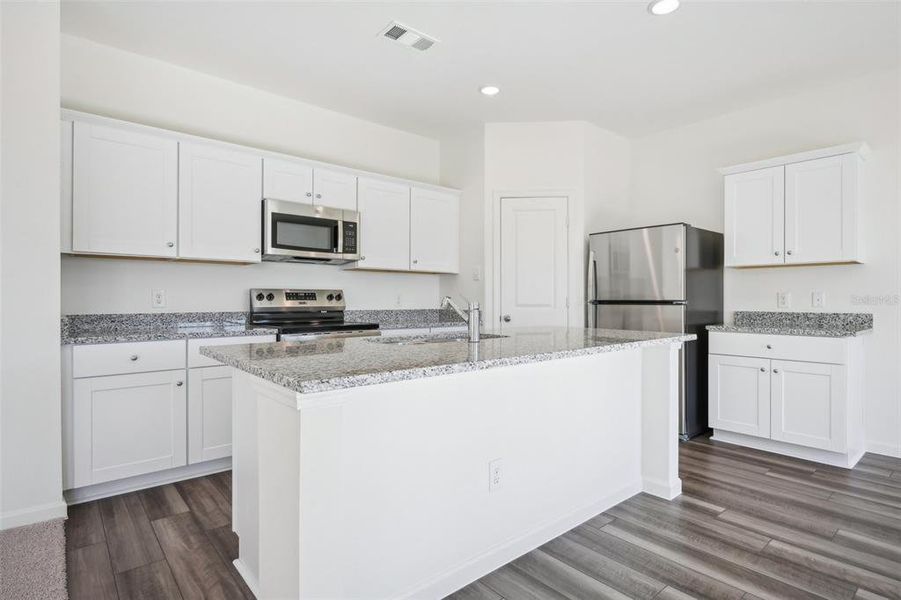 Furnished interior view inside a new home in Pelham Square, Deland (Image 9).