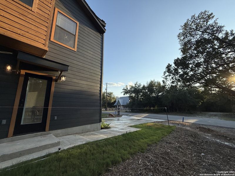 Front exterior of a new home in , Canyon Lake, TX, highlighting curb appeal (Image 17).