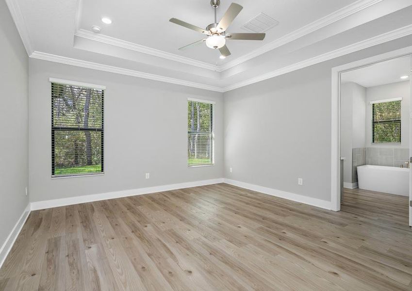 Incredible master bedroom with soaring ceilings.