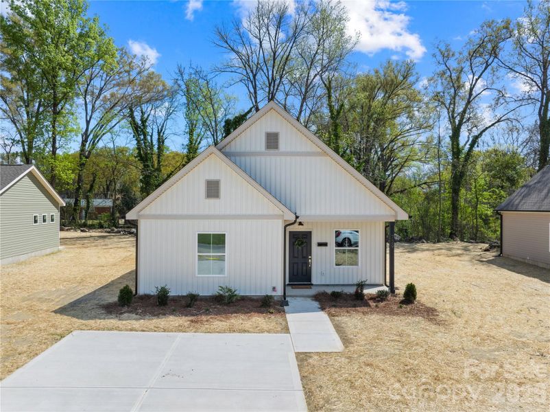 Front exterior of a new home in , Rock Hill, SC, highlighting curb appeal (Image 22).