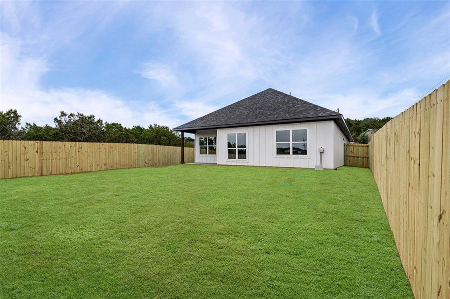 Exterior details and patio area of a home in , Granbury (Image 24).