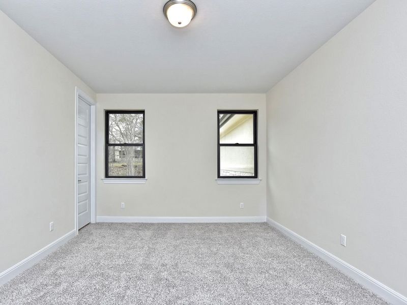 Representative unfurnished interior of a home built from the Avalon by Giddens Homes in Scofield Farms Estates, Georgetown (Image 156).