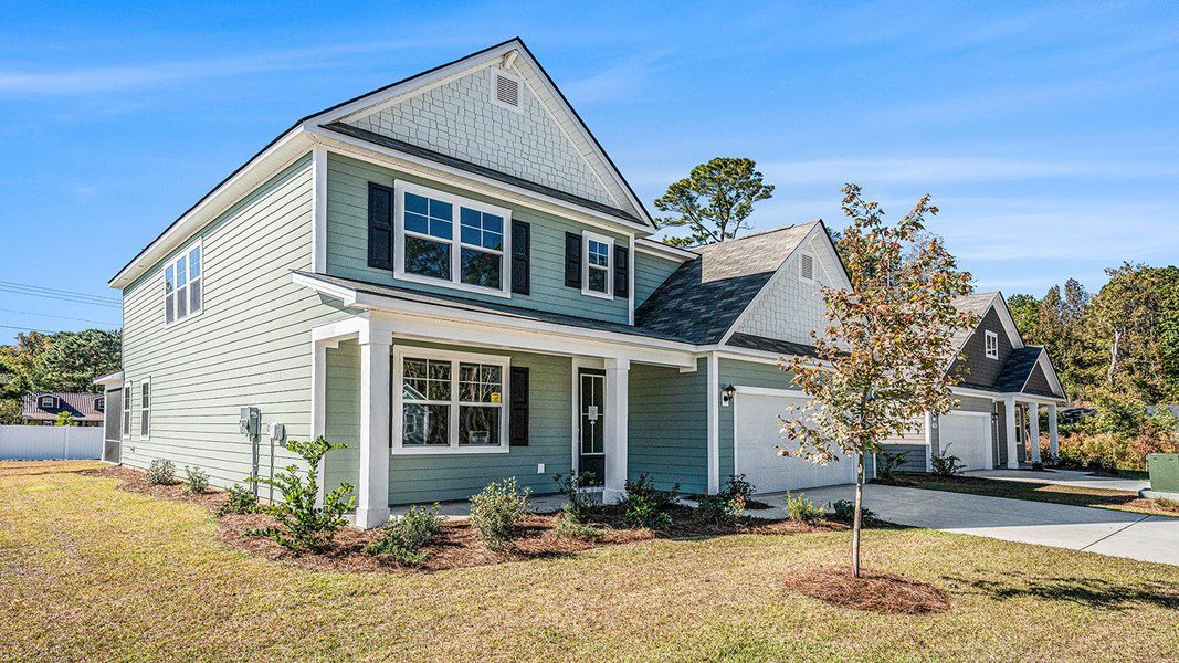 Front exterior of a new home in Haven View, Murrells Inlet, SC, highlighting curb appeal (Image 2).
