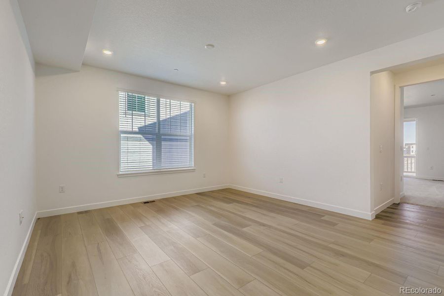 Spacious, unfurnished interior of a new home in Sunset Village: The Grand Collection, Erie (Image 10). Spacious, unfurnished interior of a new home in Sunset Village: The Grand Collection, Erie (Image 10).