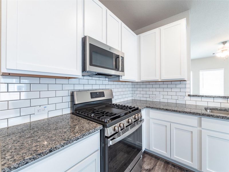 Furnished interior view inside a new home in Sweetgrass Village, Crosby (Image 5).