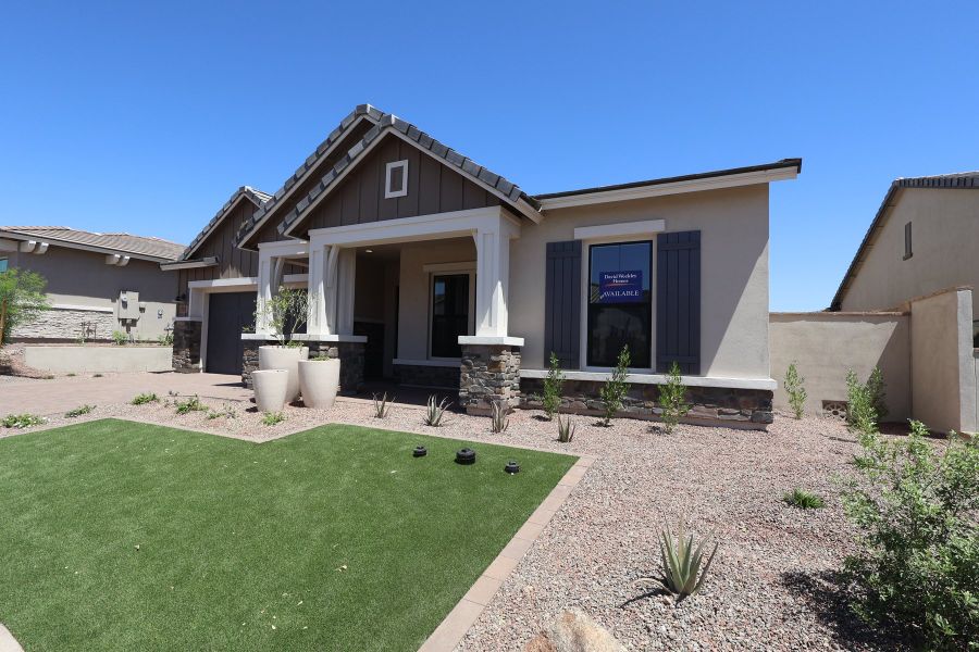 Front exterior of a new home in Overlook at Verrado Regent Hills, Buckeye, AZ, highlighting curb appeal (Image 8).