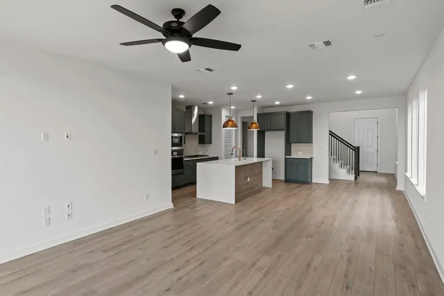 Furnished interior view inside a new home in Terrace Collection at Lariat, Liberty Hill (Image 9).