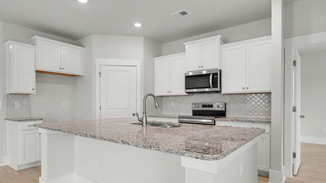 Furnished interior view inside a new home in Chapman Village, Conway (Image 5).