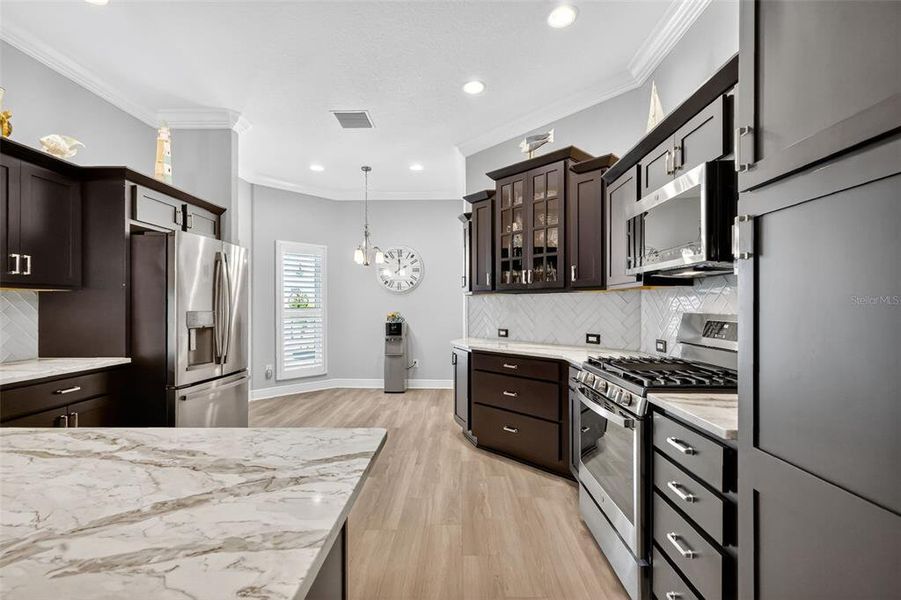 Furnished interior view inside a new home in , The Villages (Image 14).