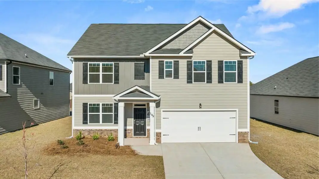 Front exterior of a new home in Teamon Pointe, Griffin, GA, highlighting curb appeal (Image 11).