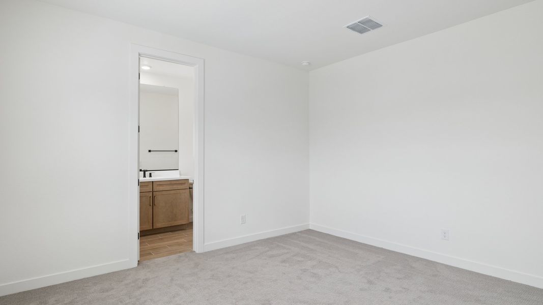 Representative unfurnished interior of a home built from the Phoenician by D.R. Horton in The Ridge at Stone Butte, Phoenix (Image 32).