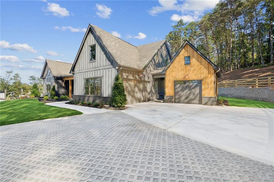 Front exterior of a new home in , Cumming, GA, highlighting curb appeal (Image 23). Front exterior of a new home in , Cumming, GA, highlighting curb appeal (Image 23).