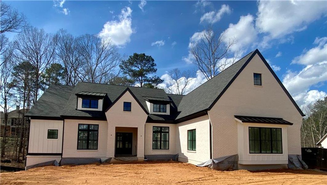Front exterior of a new home in , Acworth, GA, highlighting curb appeal (Image 1). Front exterior of a new home in , Acworth, GA, highlighting curb appeal (Image 1).