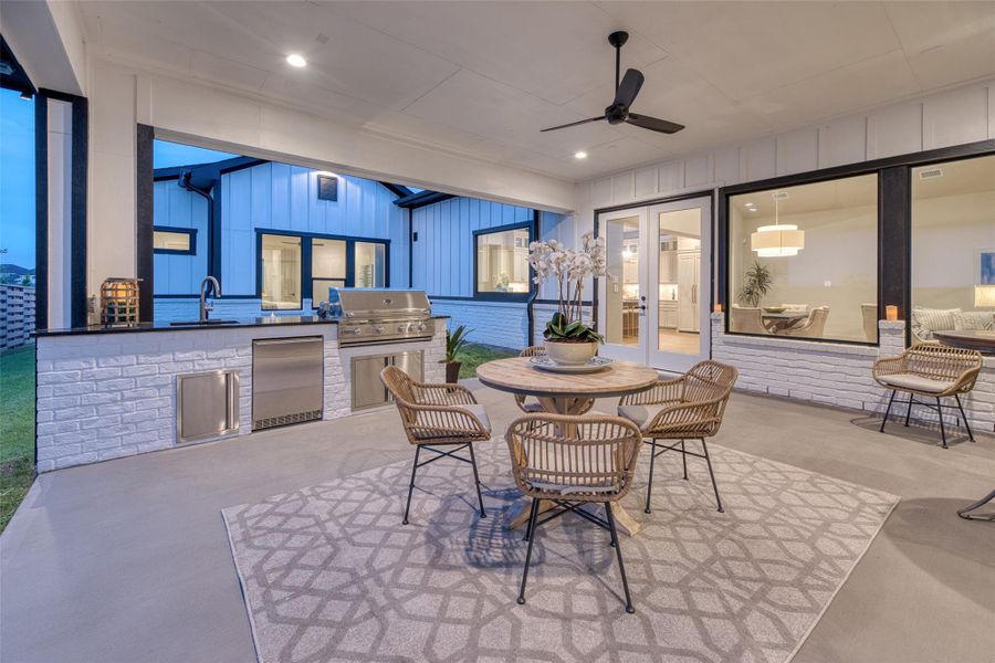 Massive covered patio with outdoor kitchen Massive covered patio with outdoor kitchen