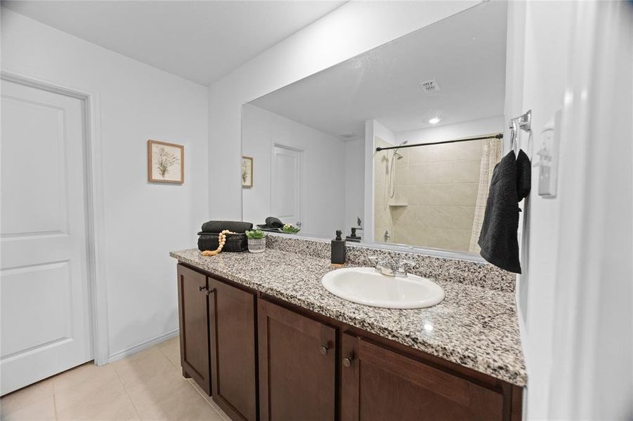 Furnished interior view inside a new home in Mobberly Farms: Watermill Collection, Pilot Point (Image 3).