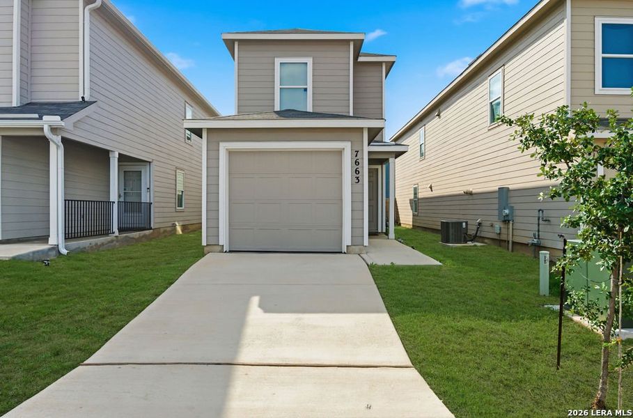 Front exterior of a new home in Aston Park, San Antonio, TX, highlighting curb appeal (Image 2).