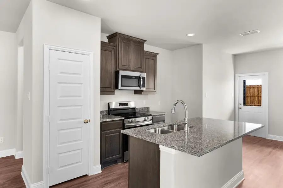 Furnished interior view inside a new home in Stonecreek, Sulphur Springs (Image 7).