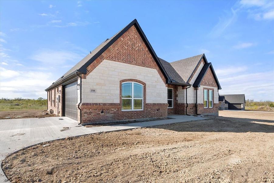 View of front of home with a garage