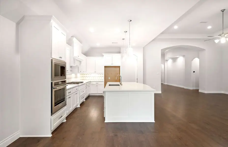 Representative furnished interior of a home built from the 3068 by Ravenna Homes in The Woodlands Hills 65′, Willis (Image 8).