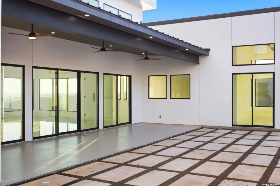 Exterior details and patio area of a home in , San Antonio (Image 46).