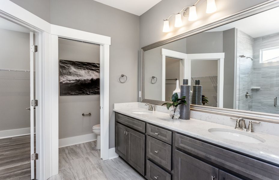 Owner's Dual Vanity. Model Home Representation.