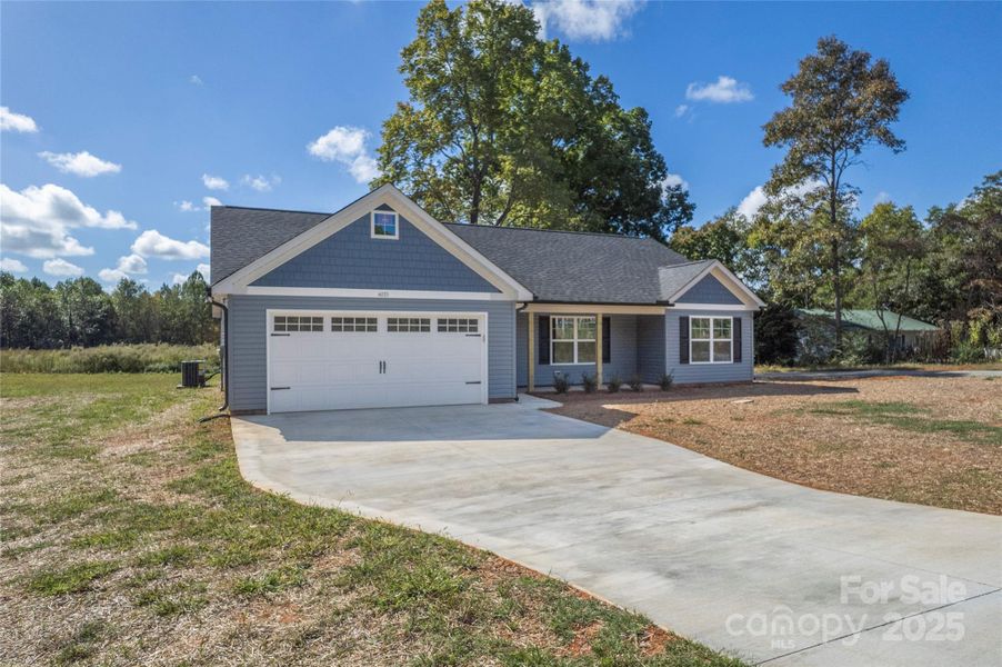 Front exterior of a new home in , Asheboro, NC, highlighting curb appeal (Image 19).
