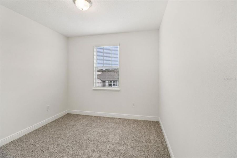 Spacious, unfurnished interior of a new home in Legends Preserve - Signature Series, Daytona Beach (Image 34).