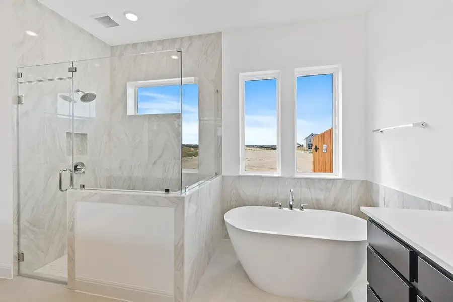 Furnished interior view inside a new home in Lariat - 70', Liberty Hill (Image 11).