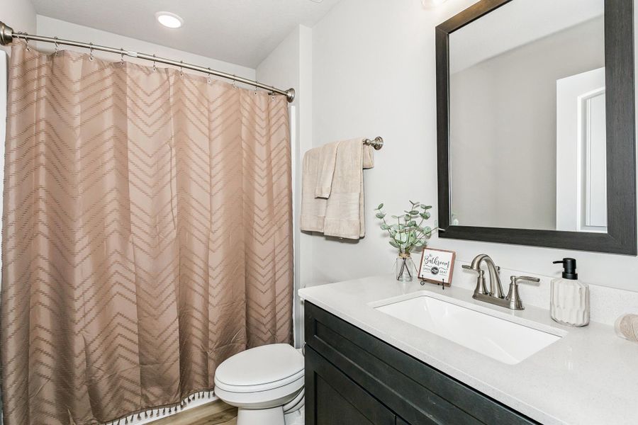 Furnished interior view inside a new home in Walther Reserve, Milton (Image 40).