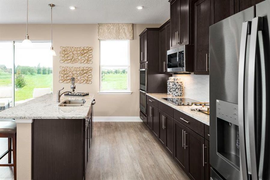 Representative furnished interior of a home built from the Rochelle by Ryan Homes in Lake Nellie Crossing, Clermont (Image 5).