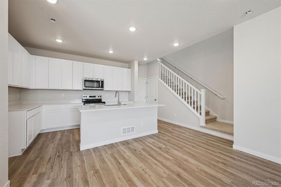 Furnished interior view inside a new home in Windler, Aurora (Image 6).