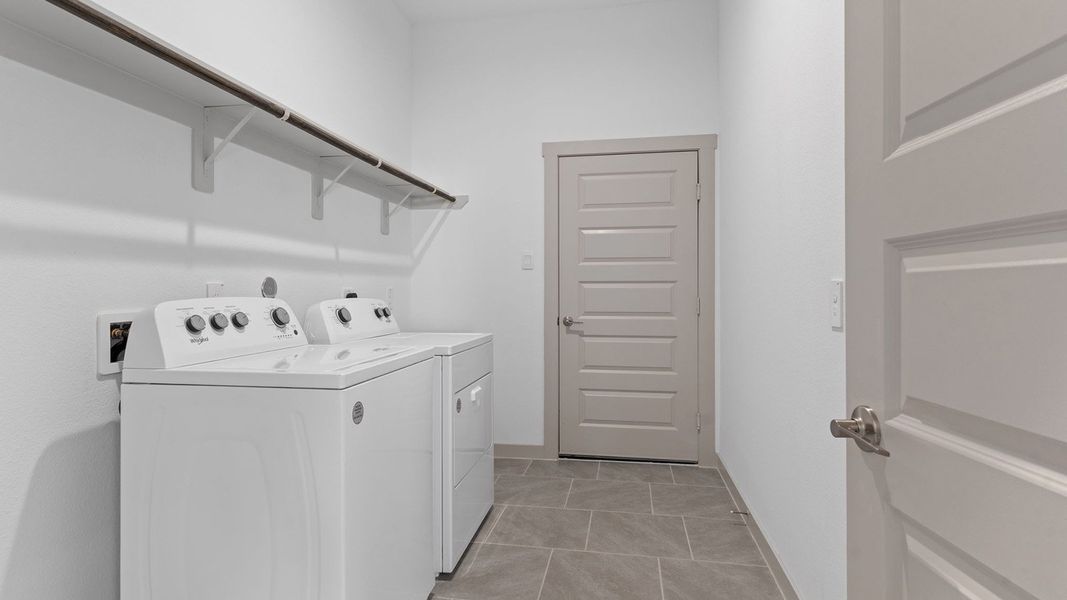 Representative furnished interior of a home built from the Plan by D.R. Horton in Davis Harbor, League City (Image 8).