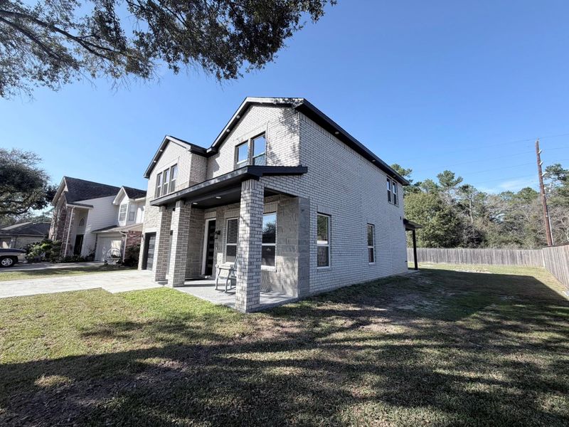 Exterior details and patio area of a home in , Houston (Image 26).