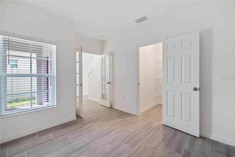 Spacious, unfurnished interior of a new home in Horse Creek at Crosswinds, Davenport (Image 8).