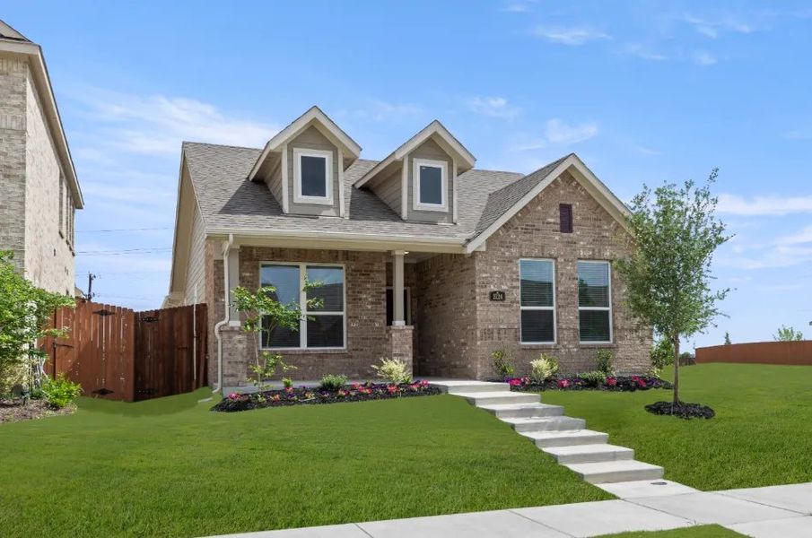 Front exterior of a new home in Heartland, Heartland, TX, highlighting curb appeal (Image 2). Front exterior of a new home in Heartland, Heartland, TX, highlighting curb appeal (Image 2).