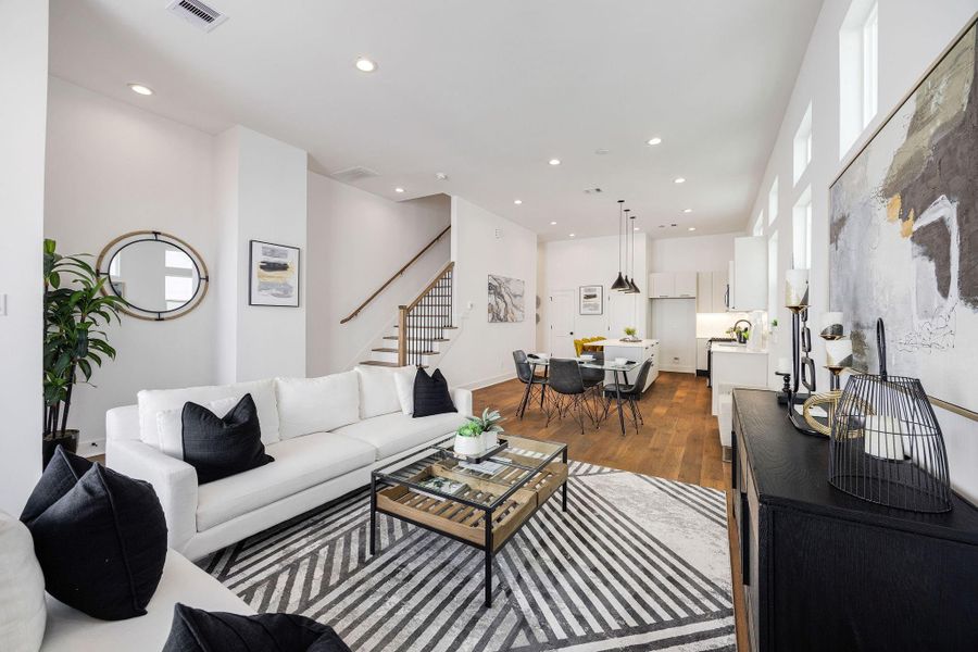 Elegant dining area seamlessly connected to a modern kitchen, perfect for entertaining and family gatherings.