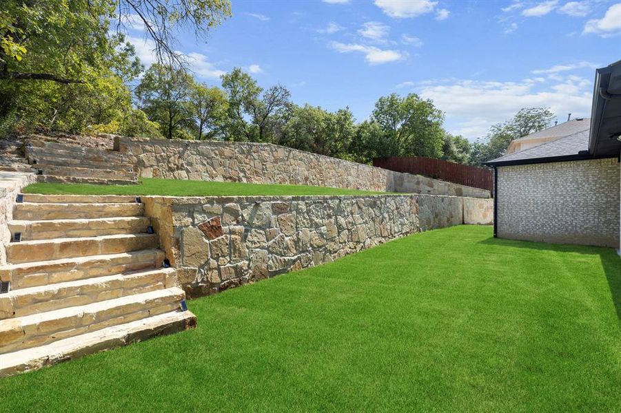 Amazing well constructed retaining walls in this huge backyard!