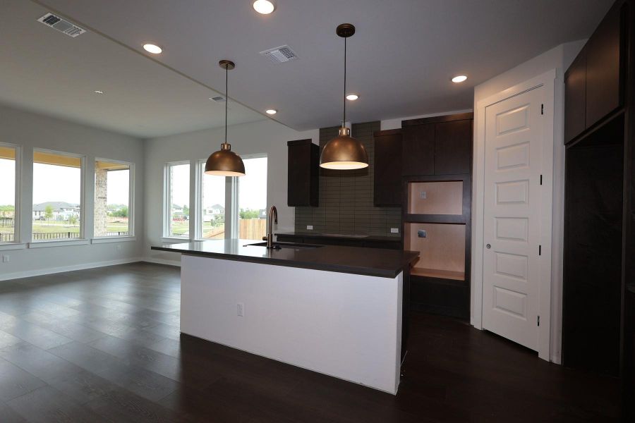 Furnished interior view inside a new home in Flora, Hutto (Image 8).