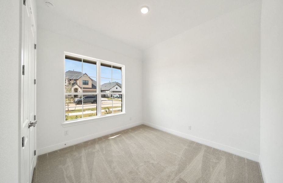 Representative unfurnished interior of a home built from the Chilton by Pulte Homes in Saddleback at Santa Rita Ranch, Liberty Hill (Image 9).