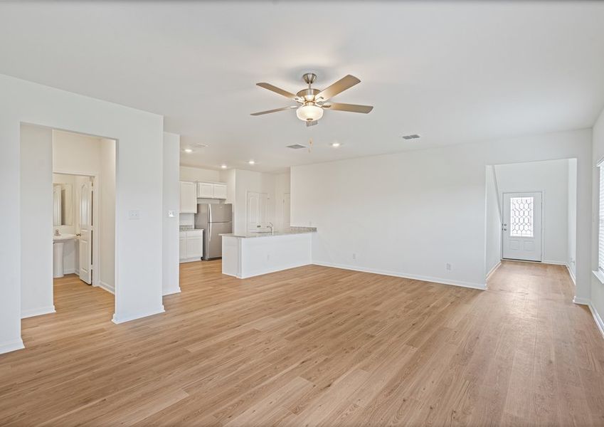 Spacious family room and chef-ready kitchen Spacious family room and chef-ready kitchen