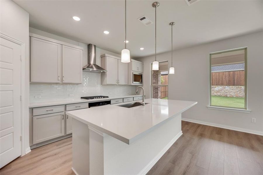 Furnished interior view inside a new home in Villages of Hurricane Creek, Anna (Image 9).