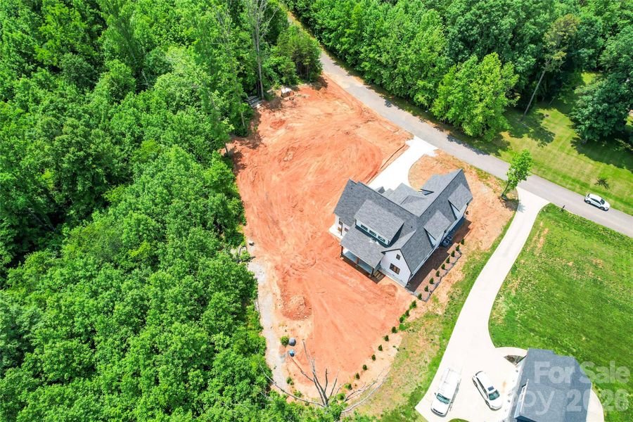 aeria. almost 1 acre lot with huge flat side and rear yards